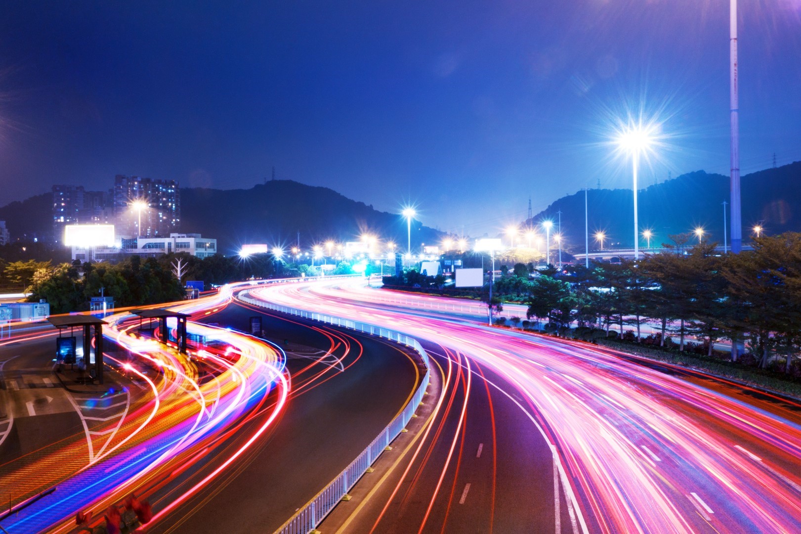 night scene of traffic on urban road and cityscape